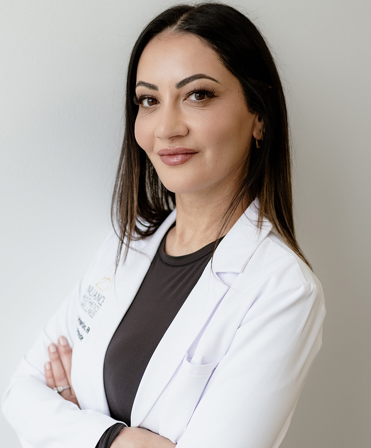 Female doctor in a white lab coat.