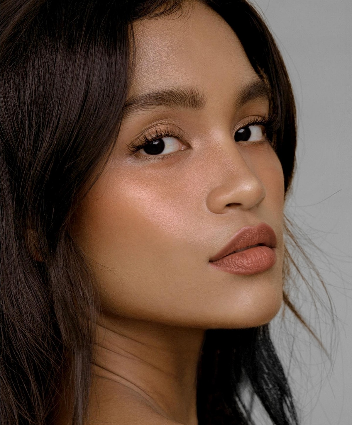 Profile of a woman with radiant skin.