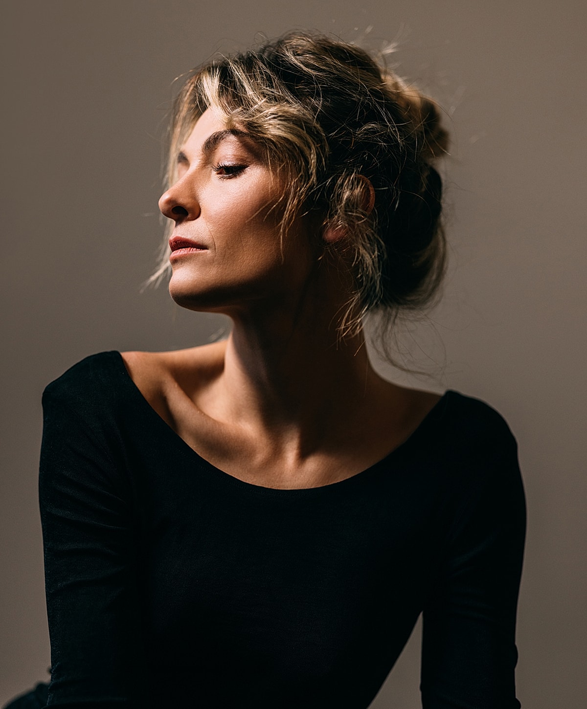 Profile of a woman in soft light.
