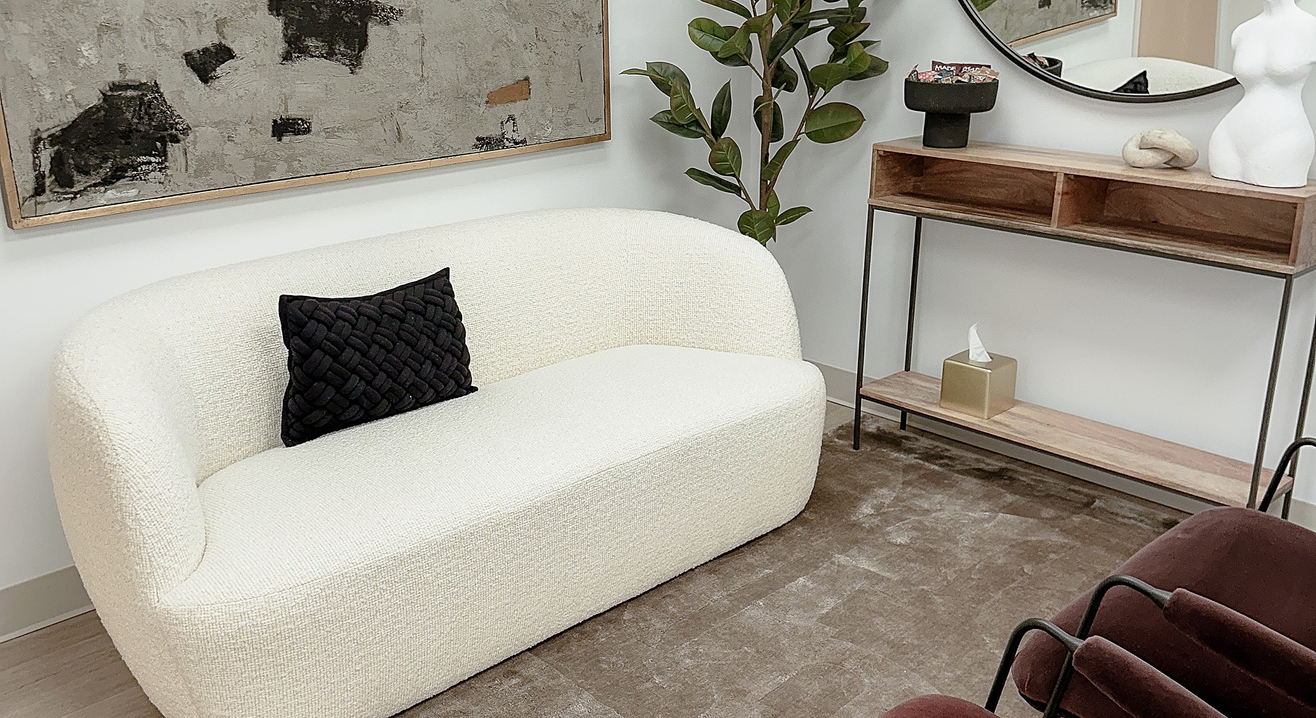 Modern living room with stylish furniture and decor.
